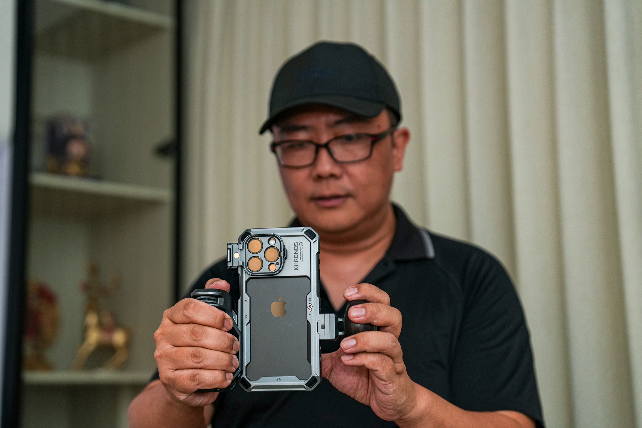 Lumida Studios preparing a phone rig during a property photography shoot