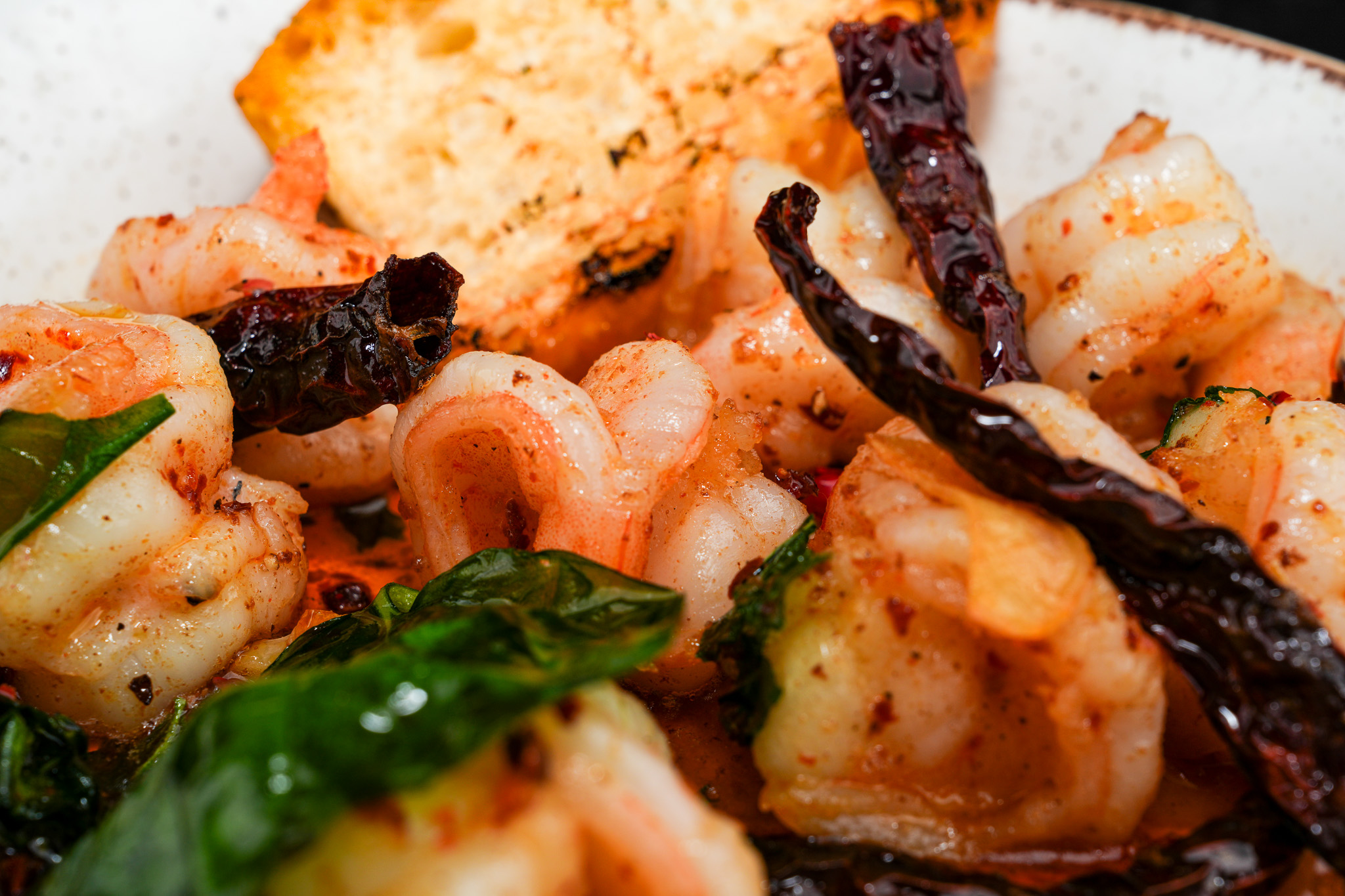 Garlic prawns with toasted bread and charred peppers